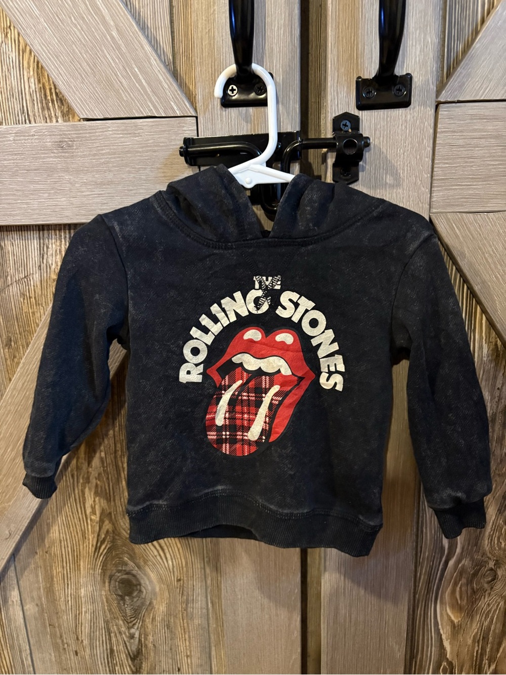 the Rolling Stones Black Kid’s Hoodie with Red Plaid Tongue Graphic